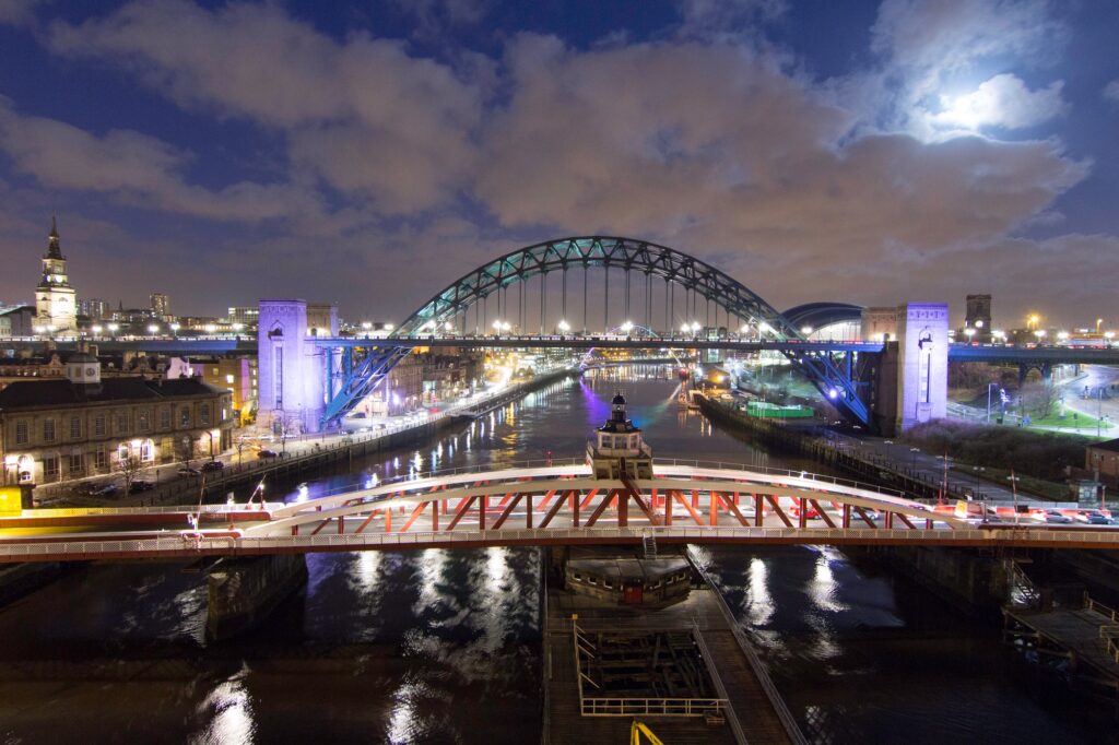 Swing bridge and Tyne bridge at night, Newcastle, UK